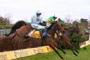 Defi Du Seuil ridden by Barry Geraghty jump the last to win the The Class One Betfair TingleCreek Steeple Chase ahead of Un De Sceaux ridden by Paul Townsend (left) during day two of the Betfair Tingle Creek Festival at Sandown Park, Esher. PA Photo.