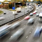 Stock image of cars travelling along the motorway. Image via PA.