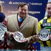 Trainer Nicky Henderson and jockey Nico de Boinville with their trophies after Shishkin's win in the Clarence House ChasePicture: Sue Orpwood