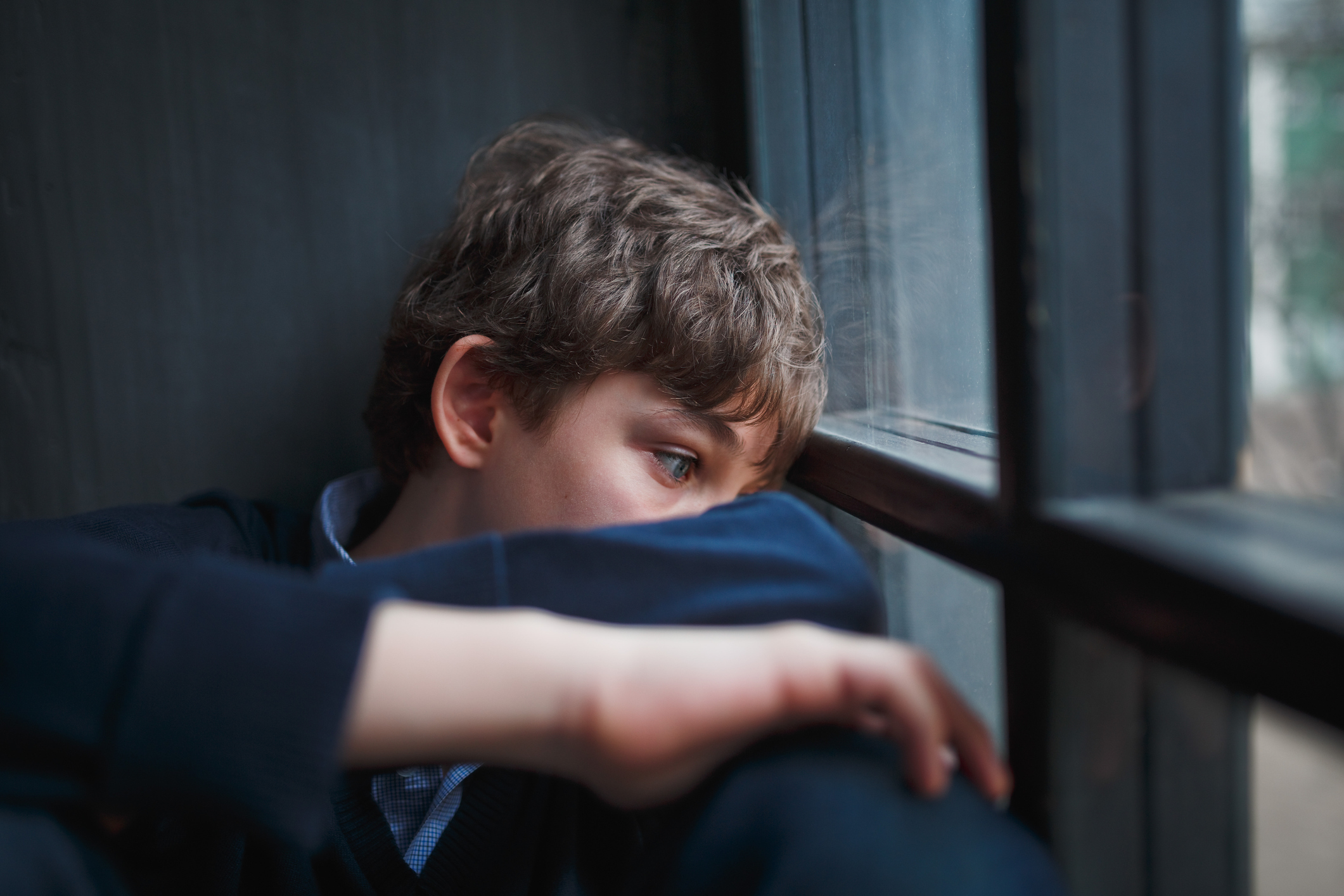  A generic photo posed by a model of a boy looking sadly out of a window. See PA Feature FAMILY Expert Mental Health. Picture credit should read: PA Photo/thinkstockphotos. WARNING: This picture must only be used to accompany PA Feature FAMILY Expert