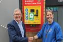 Woman helps fund new defibrillator 5 years after requiring urgent care in town centre
