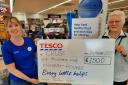 Thames Valley Berkshire Cruse Bereavement Support  receiving the cheque from Tesco