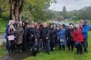 Campaigners next to a tree set to be chopped down