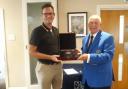 Kevin Freeman receives the Armstrong Medal from club captain Peter Stevens