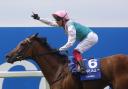 Frankie Dettori and Enable win The Coral-Eclipse Race run during Coral-Eclipse Day of the Coral Summer Festival at Sandown Park Racecourse, Esher..