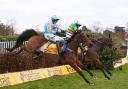 Defi Du Seuil ridden by Barry Geraghty jump the last to win the The Class One Betfair TingleCreek Steeple Chase ahead of Un De Sceaux ridden by Paul Townsend (left) during day two of the Betfair Tingle Creek Festival at Sandown Park, Esher. PA Photo.