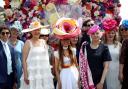Racegoers including Tracy Rose (centre) pose for the picture during day one of Royal Ascot at Ascot Racecourse. Picture by David Davies/PA Wire. See pages 6 & 7 for more