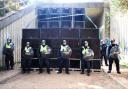 Police break up an illegal rave in Crowthorne Woods, seizing amps, photographed by Paul King