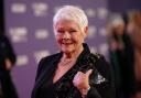 Dame Judi Dench told fans of the time she was visited by police after she and her late husband tried to herd a dear into a park