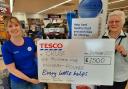 Thames Valley Berkshire Cruse Bereavement Support  receiving the cheque from Tesco