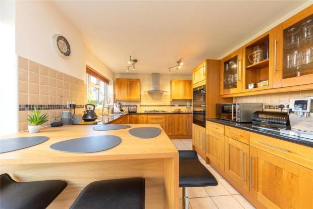 Bracknell News: The kitchen has plenty of room for cooking and storage space. Picture: Rightmove