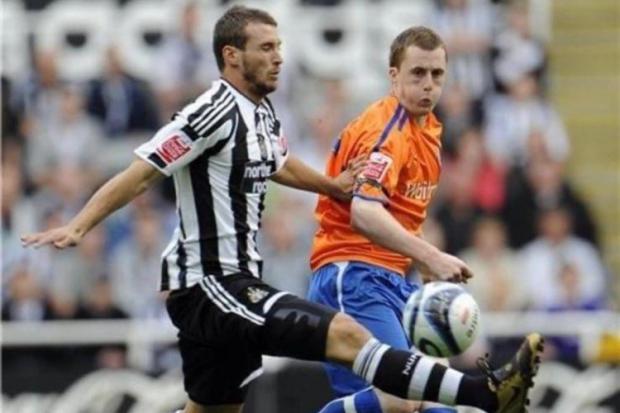Scott Davies in action for Reading against Newcastle.