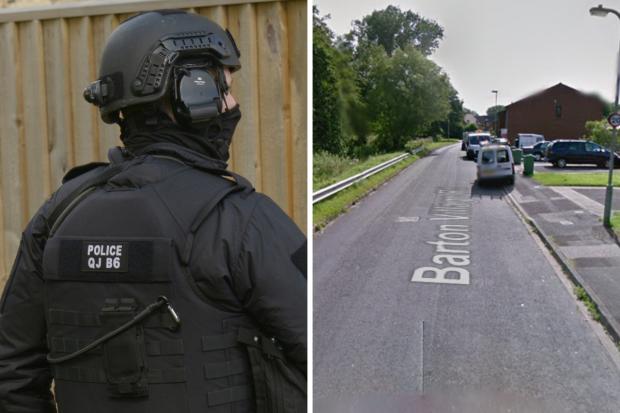 File image of armed police officer; Barton Village Road, Oxford Pictures: NQ/GOOGLE