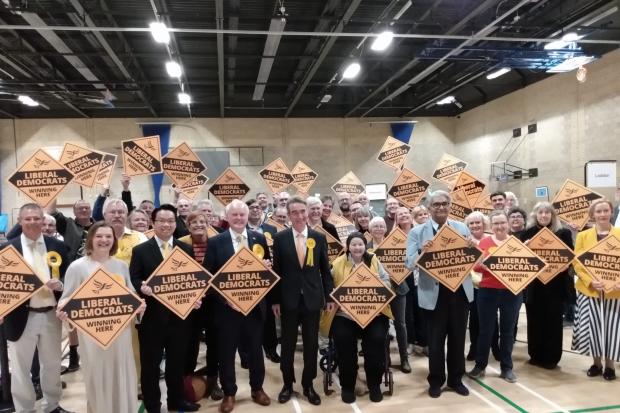 The Liberal Democrats celebrate the results in Wokingham