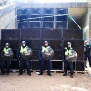 Police break up an illegal rave in Crowthorne Woods, seizing amps, photographed by Paul King