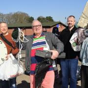 Residents of Bracknell getting rid of their old items at the recycling event. Bob Clyde pictured third to the right. Credit: Paul King