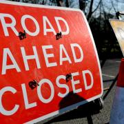 Busy road closed as route becomes impassable due to flooding