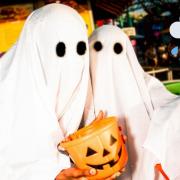 File photo of two people dressed as ghosts on Halloween