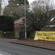 Banners calling for Edneys Hill in Barkham to be saved have been put up in the village. Credit:  Paul King