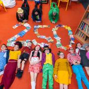 Kings Academy celebrate its World Book Day donation of £250