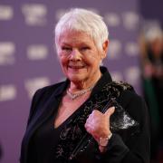 Dame Judi Dench told fans of the time she was visited by police after she and her late husband tried to herd a dear into a park