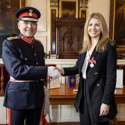 Ms Jaime Thurston BEM receives the British Empire Medal for  Services to Charity from the Lord Lieutenant, Mr Andrew Try at a  ceremony at the Windsor Guildhall on Tuesday 5 March 2024